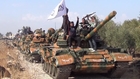 Syrian insurgents display their recently captured T-72 tanks, BMPs, ZPU and 120mm mortars