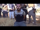 18+.....ISIL/ALQaeda terrorists executing another supporter of the syrian government.