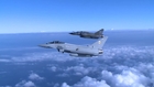 RAF Typhoon and French Air Force Mirage in flight