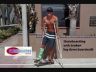 Skateboarding with Broken Leg Down Boardwalk