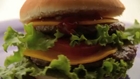 Woman Dislocated Jaw Eating Triple Decker Burger
